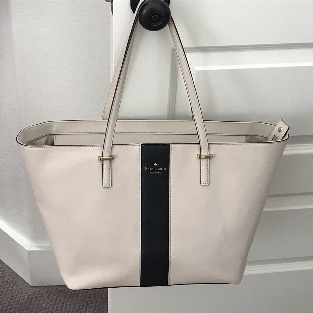 Kate Spade large handbag is stone and black.